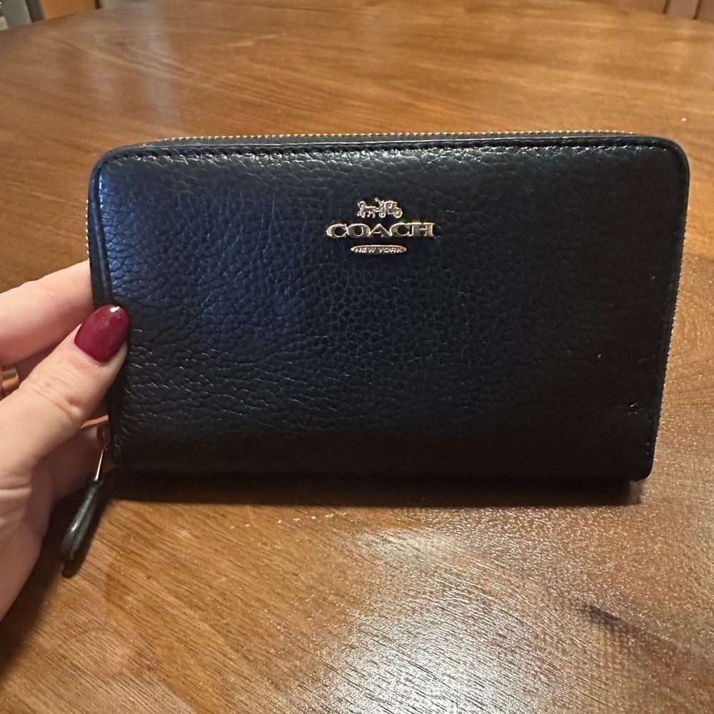 Authentic Coach continental wallet, black with gold metal.